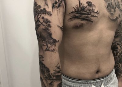 black and grey Japanese landscape tattoo sleeves and chest piece by Louise Flowerbloom, Milpitas CA