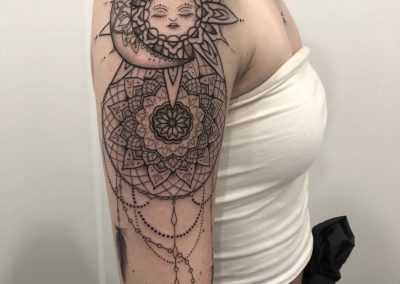 black and grey mandala and dreamcatcher shoulder sleeve tattoo by Louise Flowerbloom, Milpitas CA